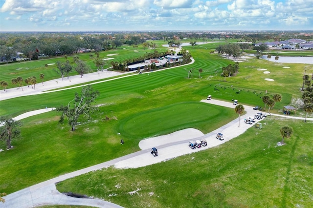 bird's eye view with view of golf course