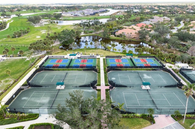 bird's eye view with golf course view and a water view