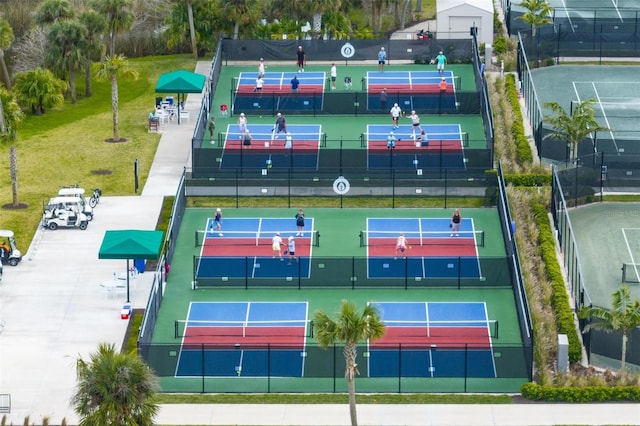 view of tennis court with fence