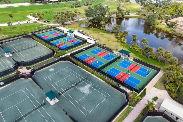 birds eye view of property with a water view