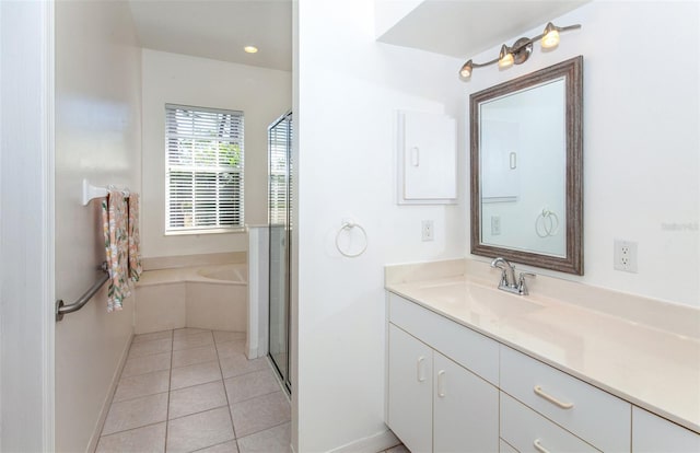 full bath featuring baseboards, tile patterned flooring, vanity, a shower stall, and recessed lighting