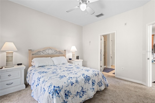 bedroom with light colored carpet, visible vents, ceiling fan, and baseboards