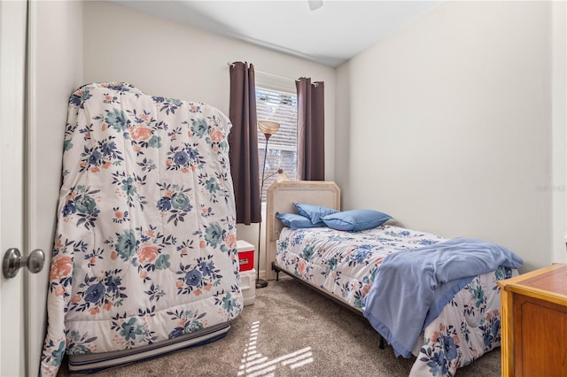 bedroom featuring carpet and a ceiling fan