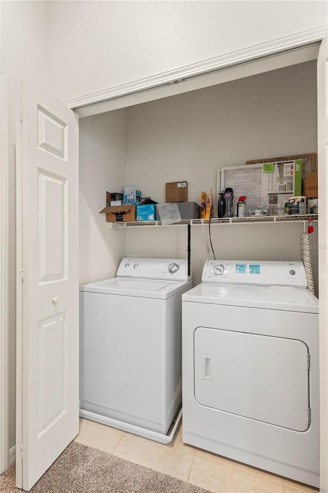 washroom with laundry area and washing machine and clothes dryer