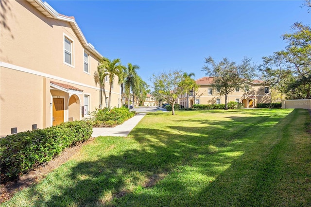 view of yard featuring a residential view