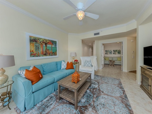 living room with light tile patterned floors, visible vents, and crown molding