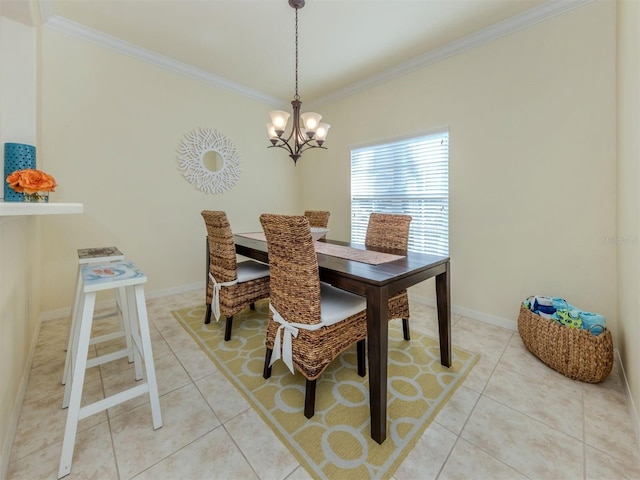 dining space with light tile patterned floors, a notable chandelier, baseboards, and crown molding