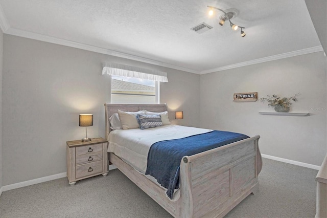 carpeted bedroom with visible vents, crown molding, a textured ceiling, and baseboards