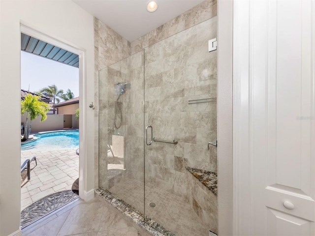 bathroom with a shower stall