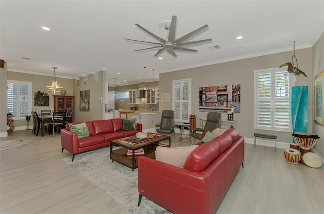 living area with recessed lighting, visible vents, baseboards, light wood finished floors, and crown molding