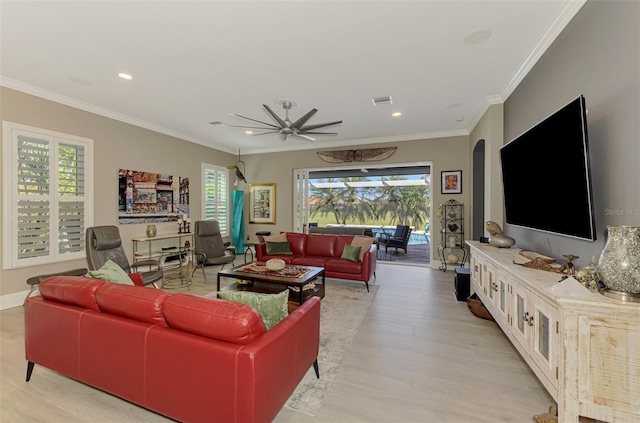 living room featuring crown molding, recessed lighting, plenty of natural light, and a ceiling fan