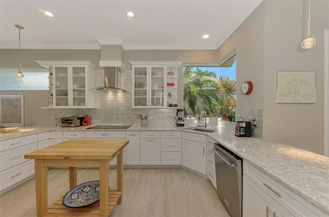 kitchen featuring dishwasher, black electric stovetop, a sink, and white cabinets