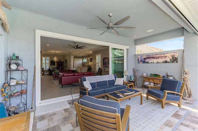 view of patio / terrace featuring an outdoor hangout area and a ceiling fan