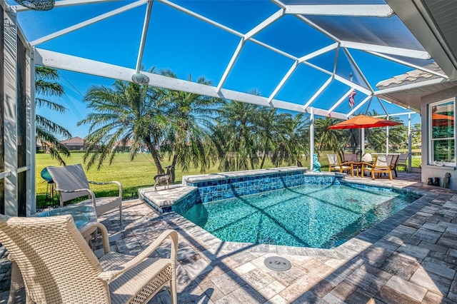 outdoor pool with glass enclosure, a patio area, and a yard