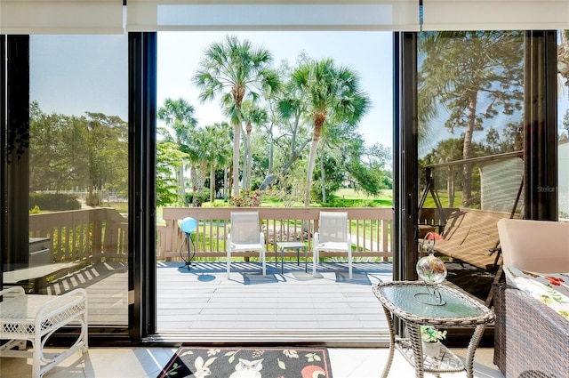 entryway featuring expansive windows