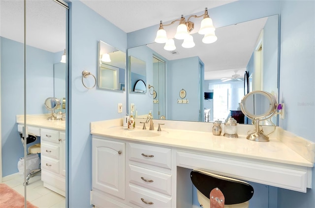 bathroom featuring vanity and tile patterned flooring