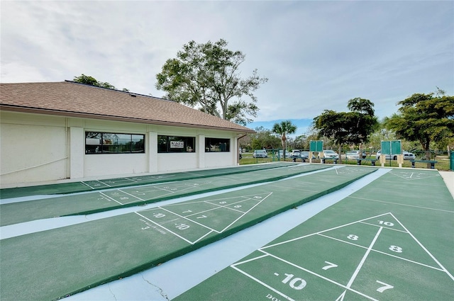 view of property's community with shuffleboard