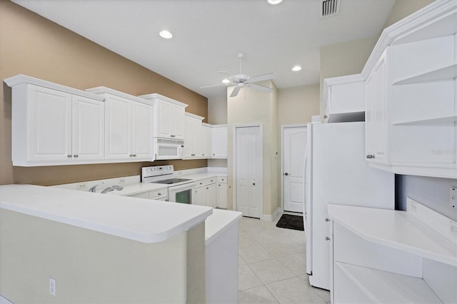 kitchen with white appliances, visible vents, a ceiling fan, a peninsula, and open shelves