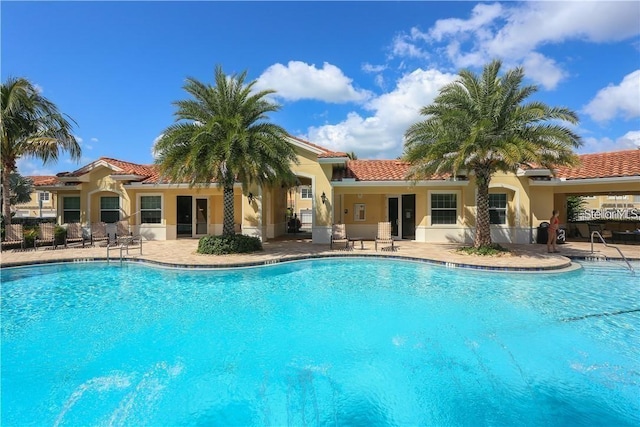 pool with a patio area