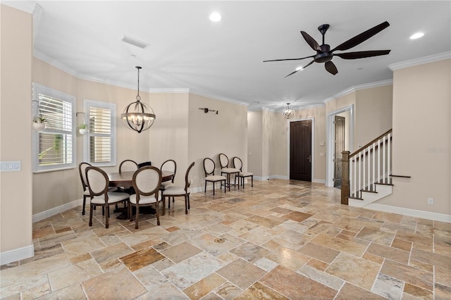 dining space with crown molding, stone tile floors, visible vents, baseboards, and stairs