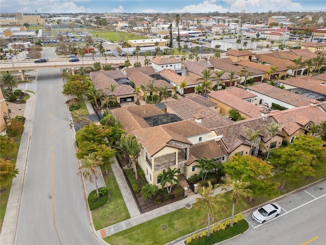 birds eye view of property with a residential view