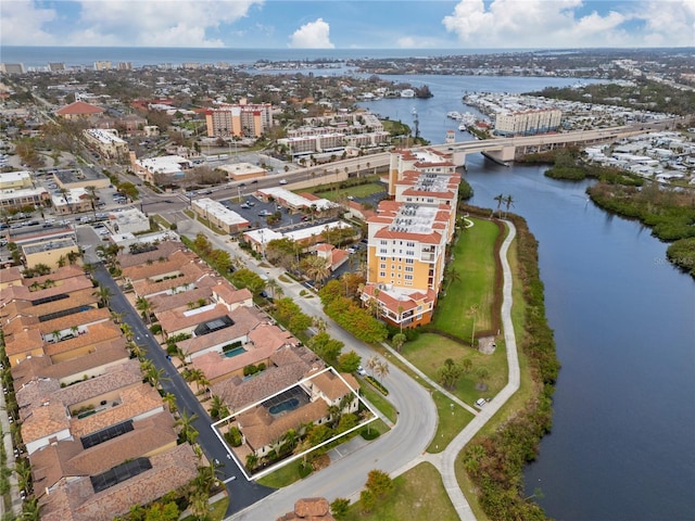 bird's eye view featuring a view of city and a water view