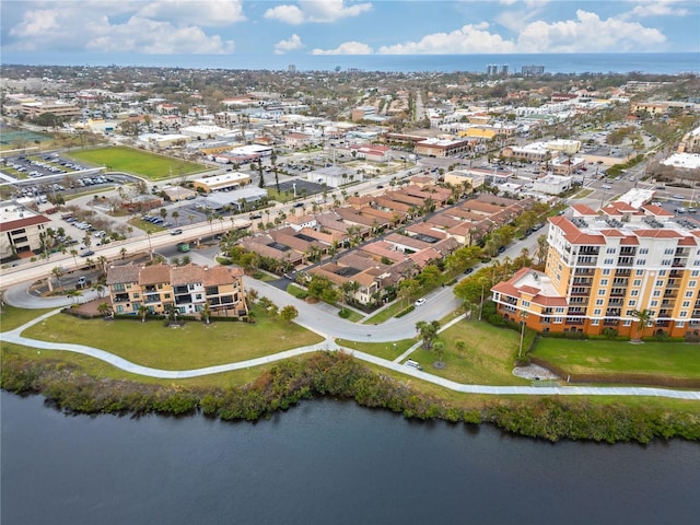 drone / aerial view with a water view