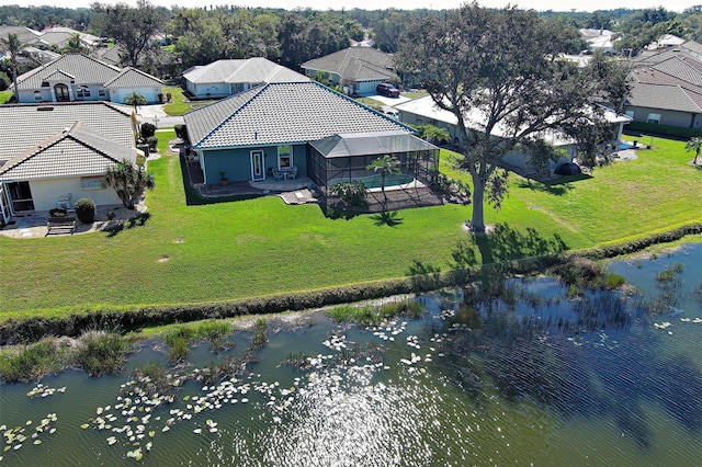 aerial view featuring a water view and a residential view