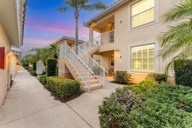 doorway to property with stucco siding