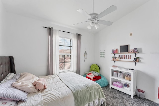 bedroom with a ceiling fan and carpet flooring