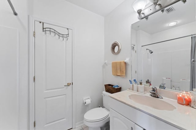 full bath featuring visible vents, a shower, toilet, and vanity