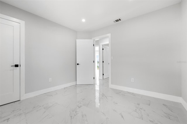 unfurnished bedroom featuring recessed lighting, baseboards, visible vents, and marble finish floor