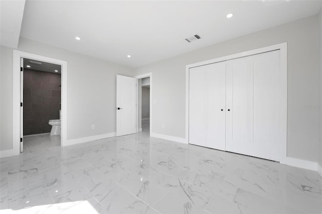 unfurnished bedroom featuring visible vents, marble finish floor, recessed lighting, a closet, and baseboards