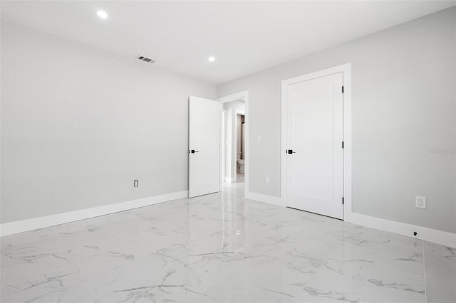 unfurnished bedroom featuring recessed lighting, visible vents, baseboards, and marble finish floor