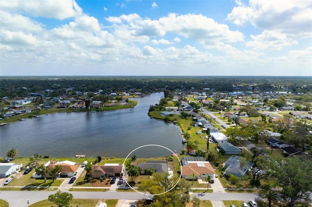 bird's eye view with a residential view and a water view