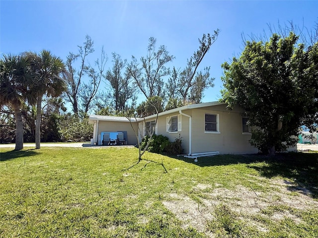 ranch-style home with a front yard