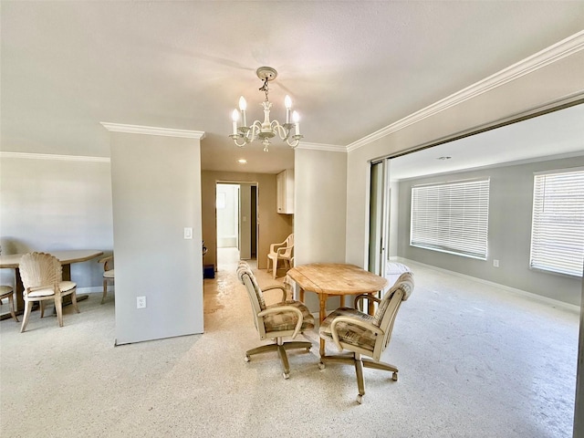 dining room featuring baseboards, crown molding, and an inviting chandelier