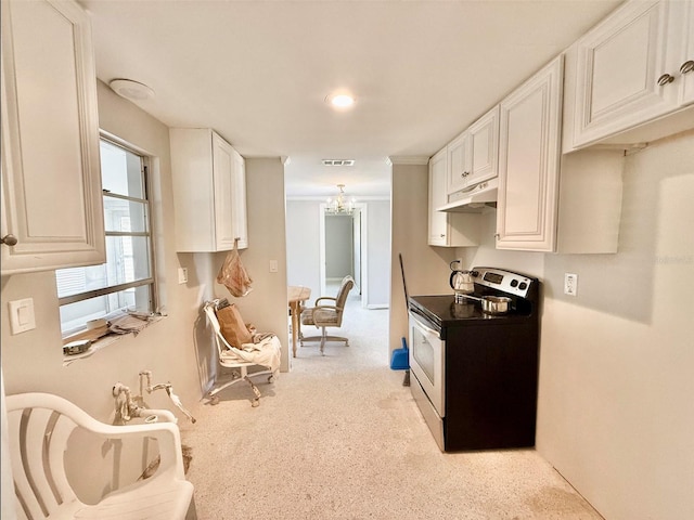 kitchen with stainless steel electric stove, visible vents, white cabinets, a chandelier, and under cabinet range hood