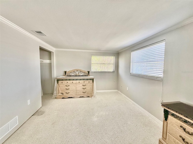 bedroom featuring visible vents, a textured ceiling, baseboards, and speckled floor