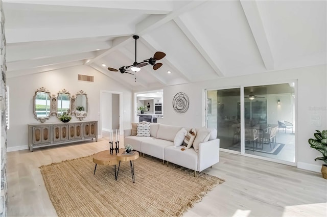 living room with baseboards, visible vents, lofted ceiling with beams, ceiling fan, and light wood-style floors