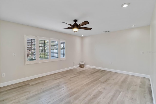 empty room with recessed lighting, baseboards, light wood-style floors, and ceiling fan