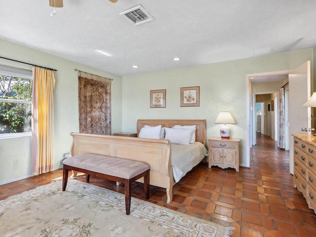 bedroom with recessed lighting, visible vents, and baseboards