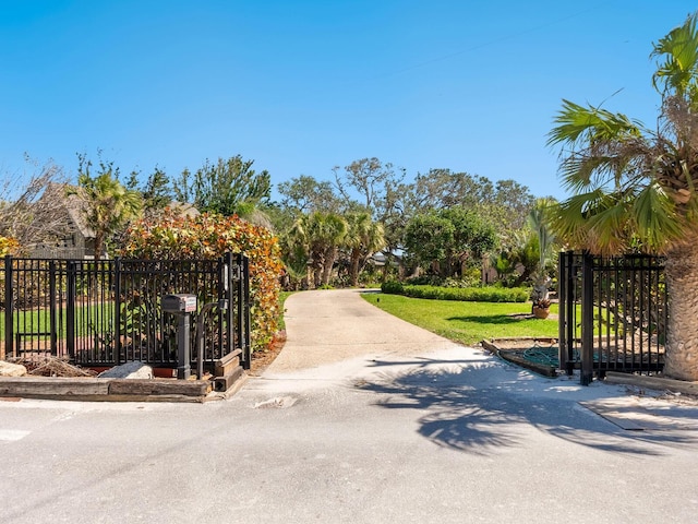 view of gate featuring fence