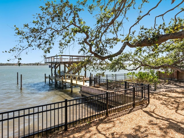 dock area featuring a water view