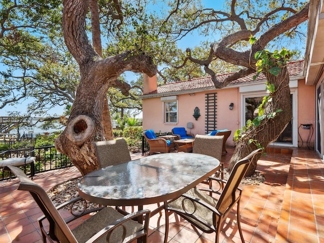 view of patio with outdoor dining space