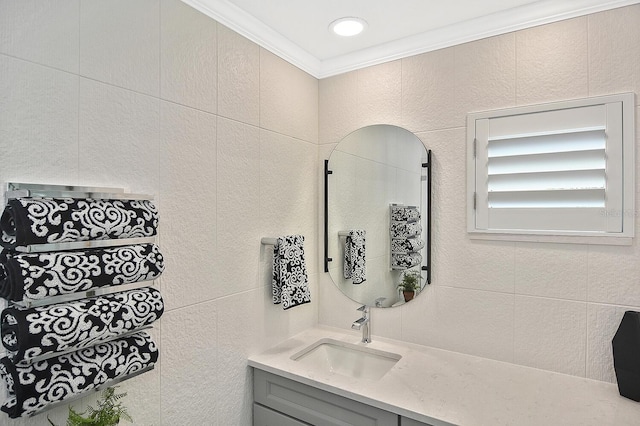 bathroom with vanity and crown molding