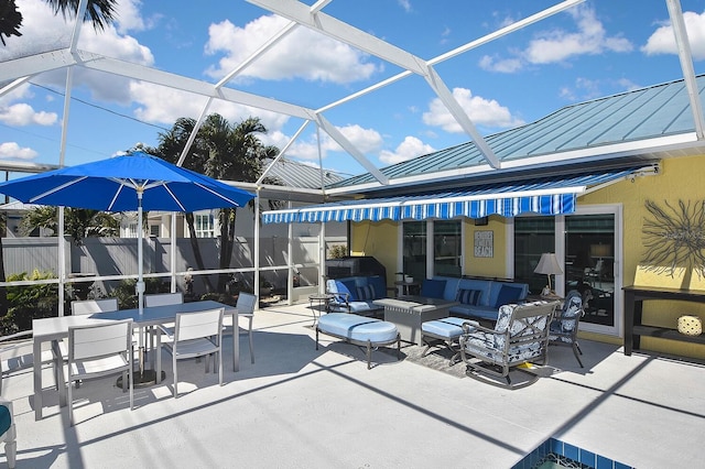 view of patio featuring a lanai, an outdoor hangout area, and outdoor dining area