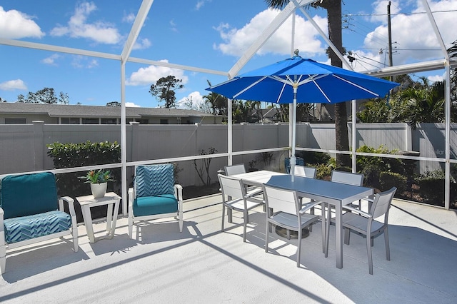 view of patio / terrace featuring outdoor dining area and a fenced backyard