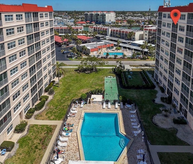 view of pool with a city view