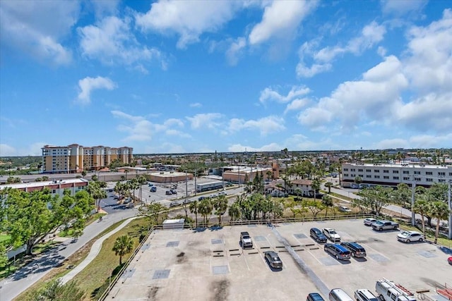 birds eye view of property with a view of city